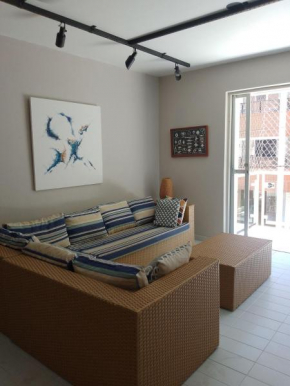 Apartamento familiar com acesso privativo à Praia Mansa